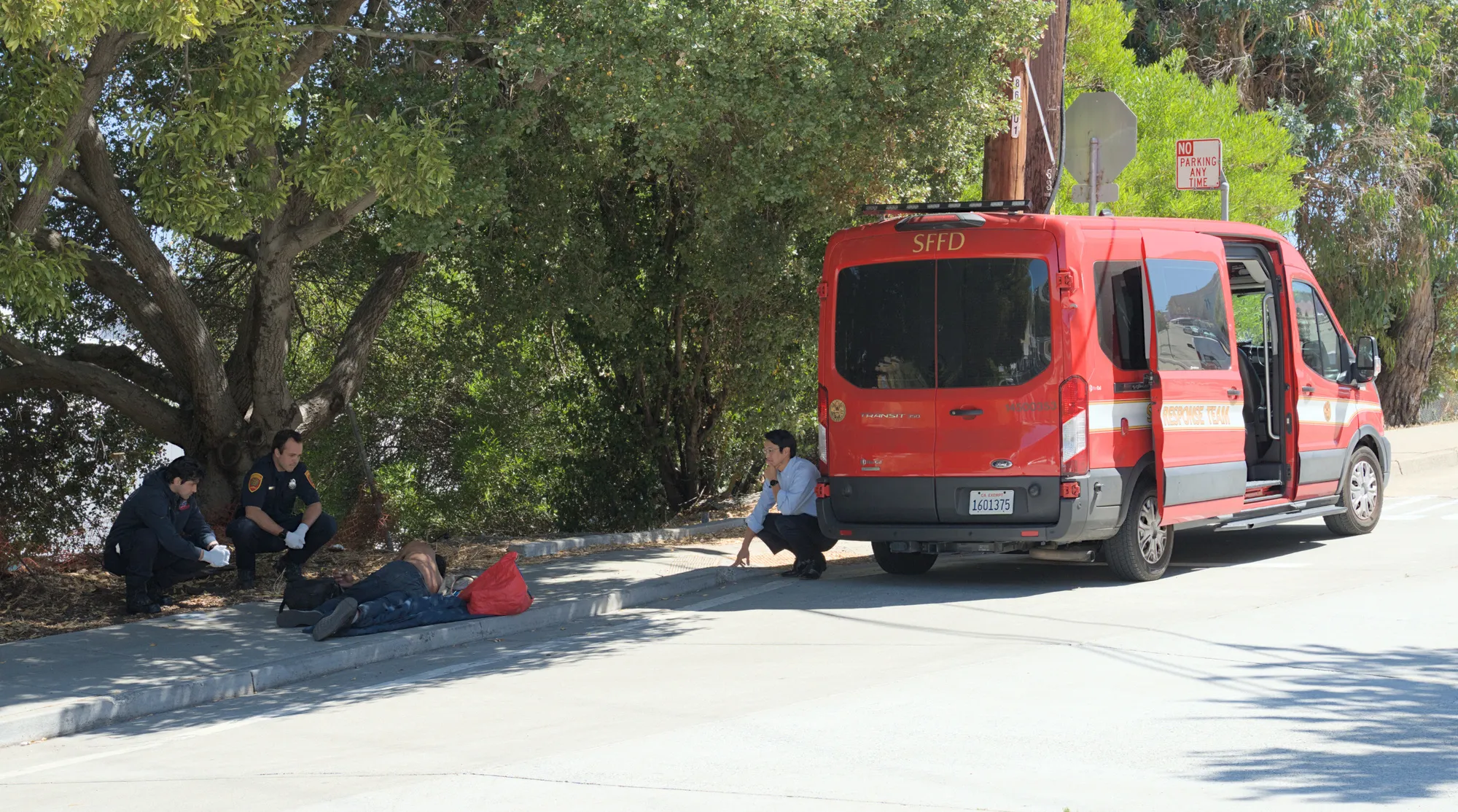 Sep 3rd, 2025: Members of the SFFD Street Crisis Response Team assist a man who was screaming on the Missouri St. sidewalk.